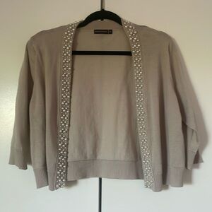 3/4 sleeve cardigan w beautiful pearl detail Perfect to dress up any outfit.